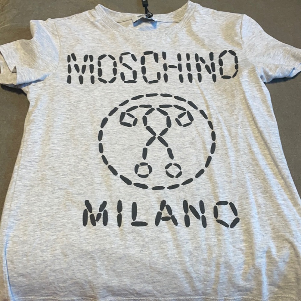 Gently used Moschino boys shirt size 10 fits like an 8